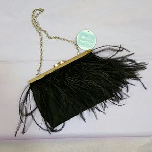 Specialty handbag black with gooselike feathers